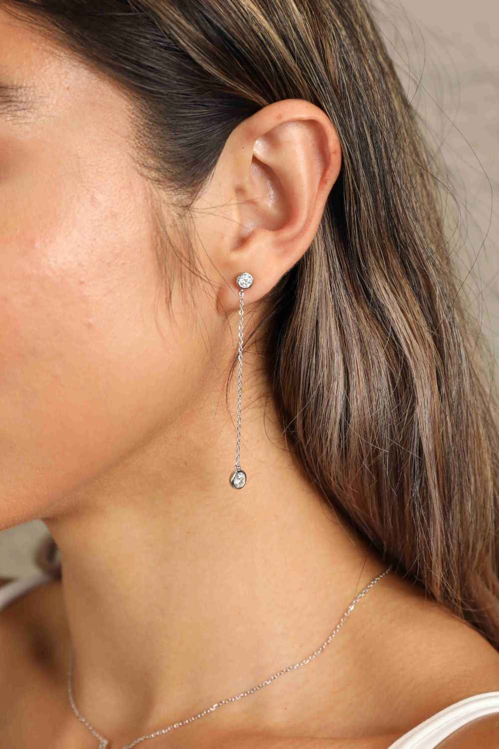 Shine in Motion with Adored Chain Earrings