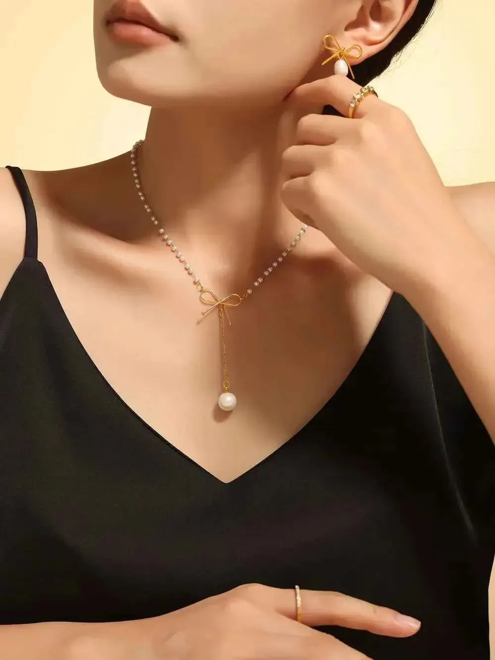 Pearl Bow Charm Gold Necklace
