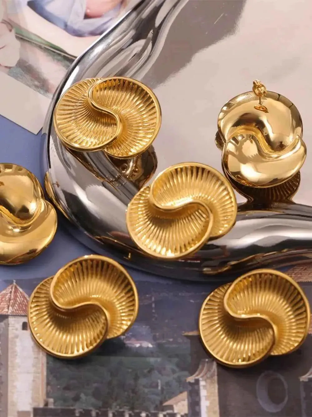 Edgy Steel Swirl Studs