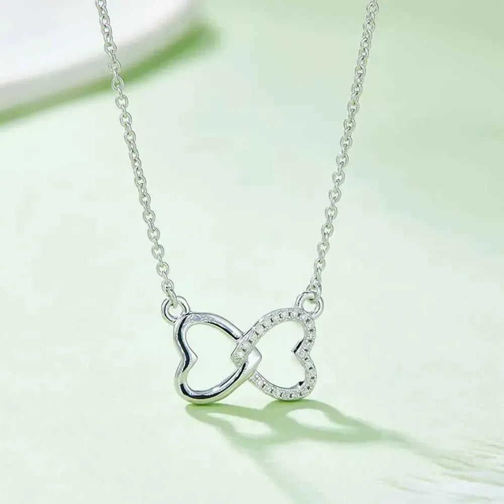 Petite Bow Heart Moissanite Pendant