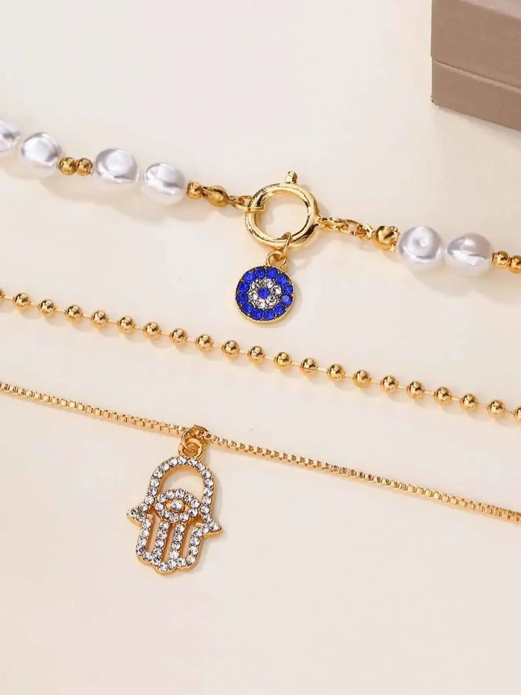 Mystic Pearl – Evil Eye & Hamsa Layered Necklace