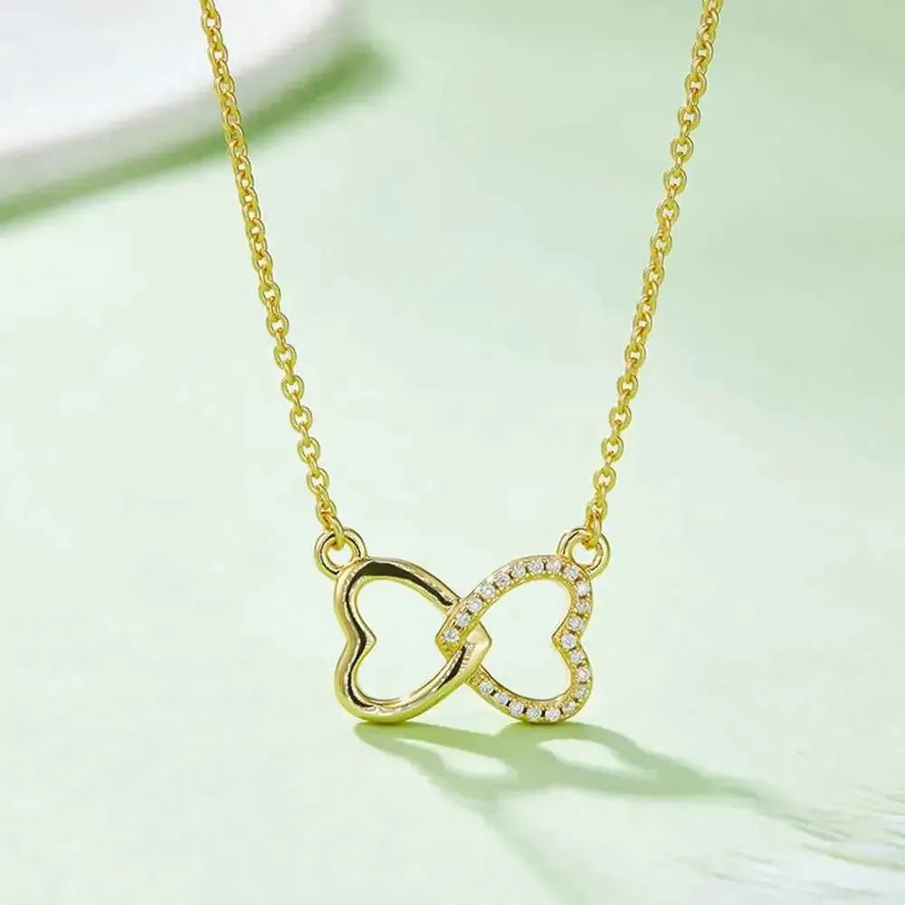 Petite Bow Heart Moissanite Pendant