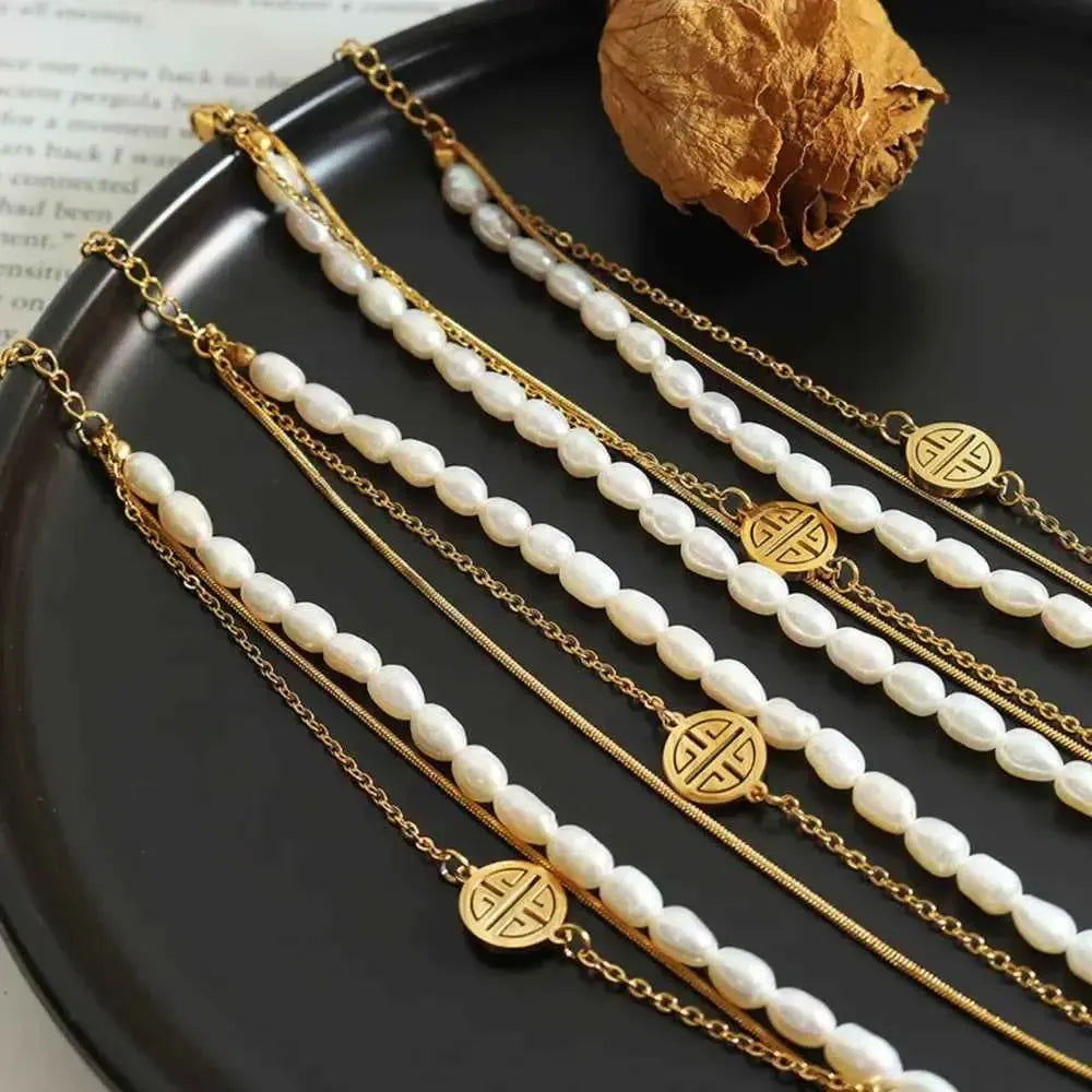 Three‑Tiered Pearl Titanium Bracelet