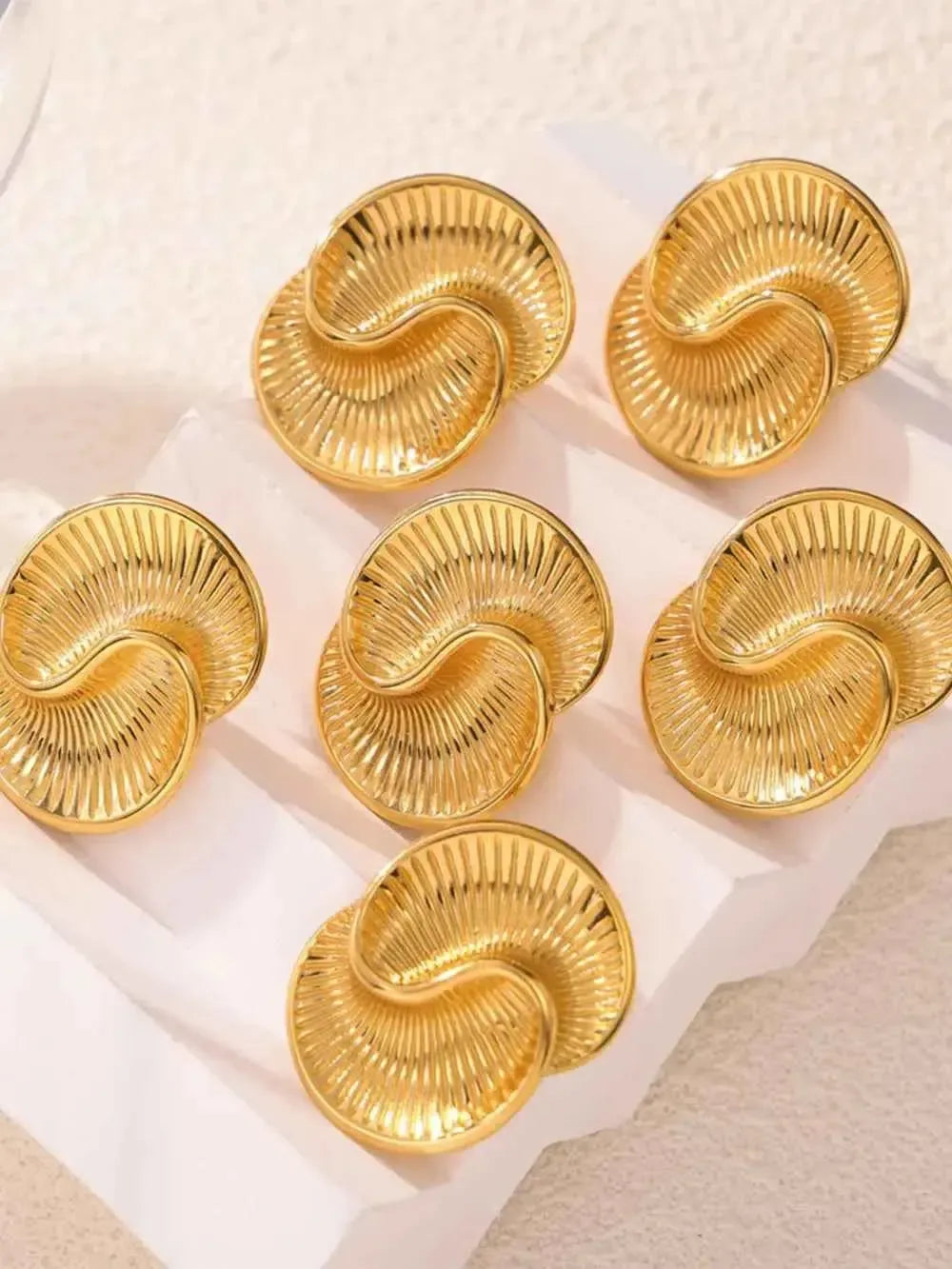 Edgy Steel Swirl Studs