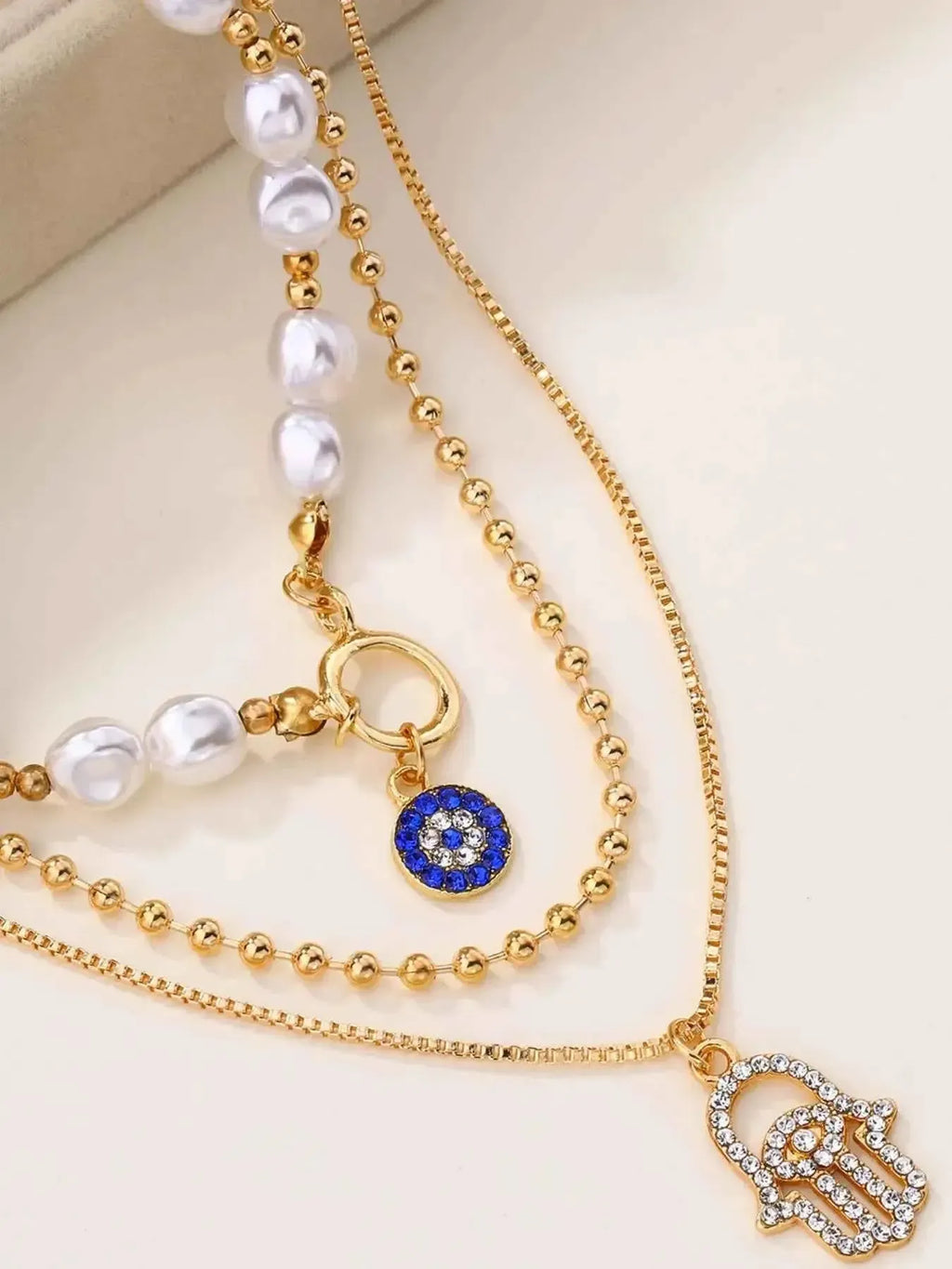 Mystic Pearl – Evil Eye & Hamsa Layered Necklace